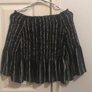 An off the shoulder striped top.